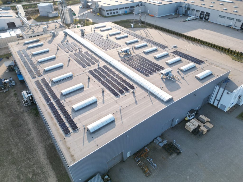 Photovoltaic panels atop Dobre Miasto factory, Poland.