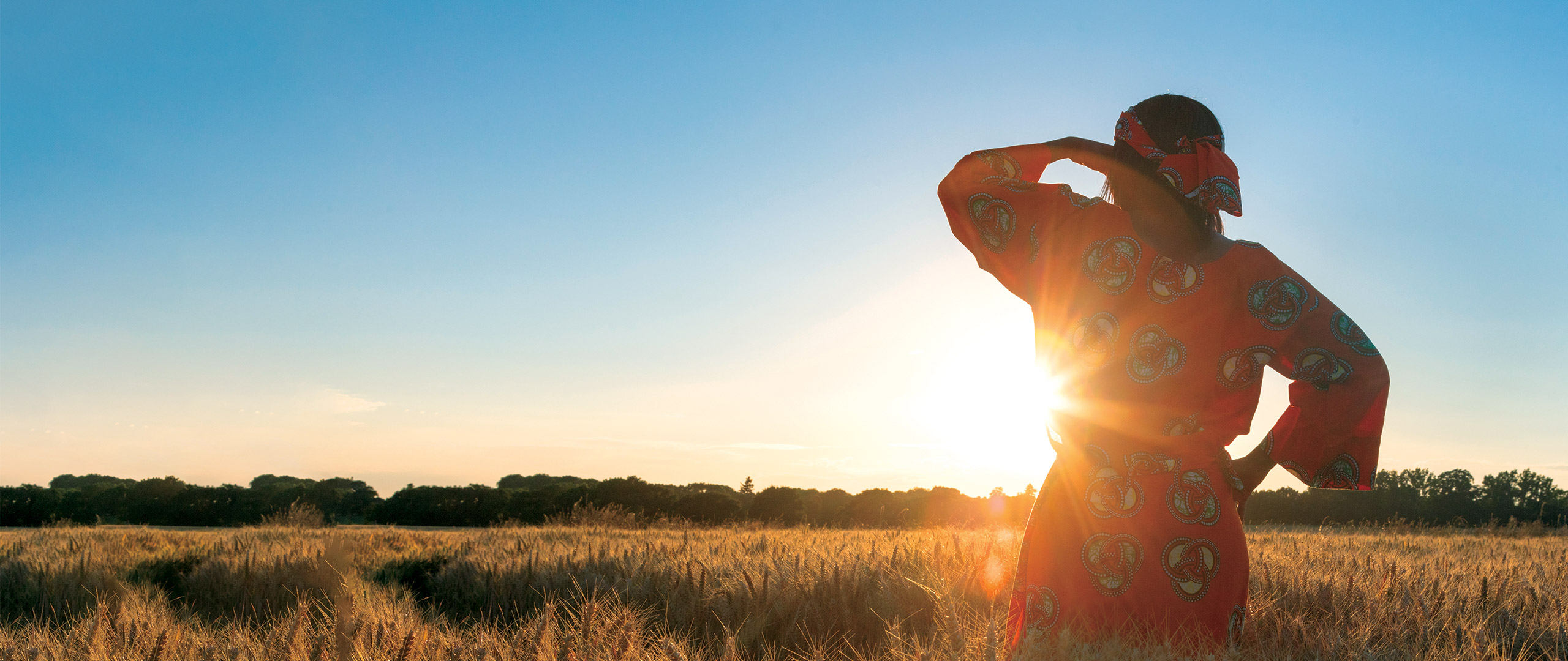 Woman looking at sunset